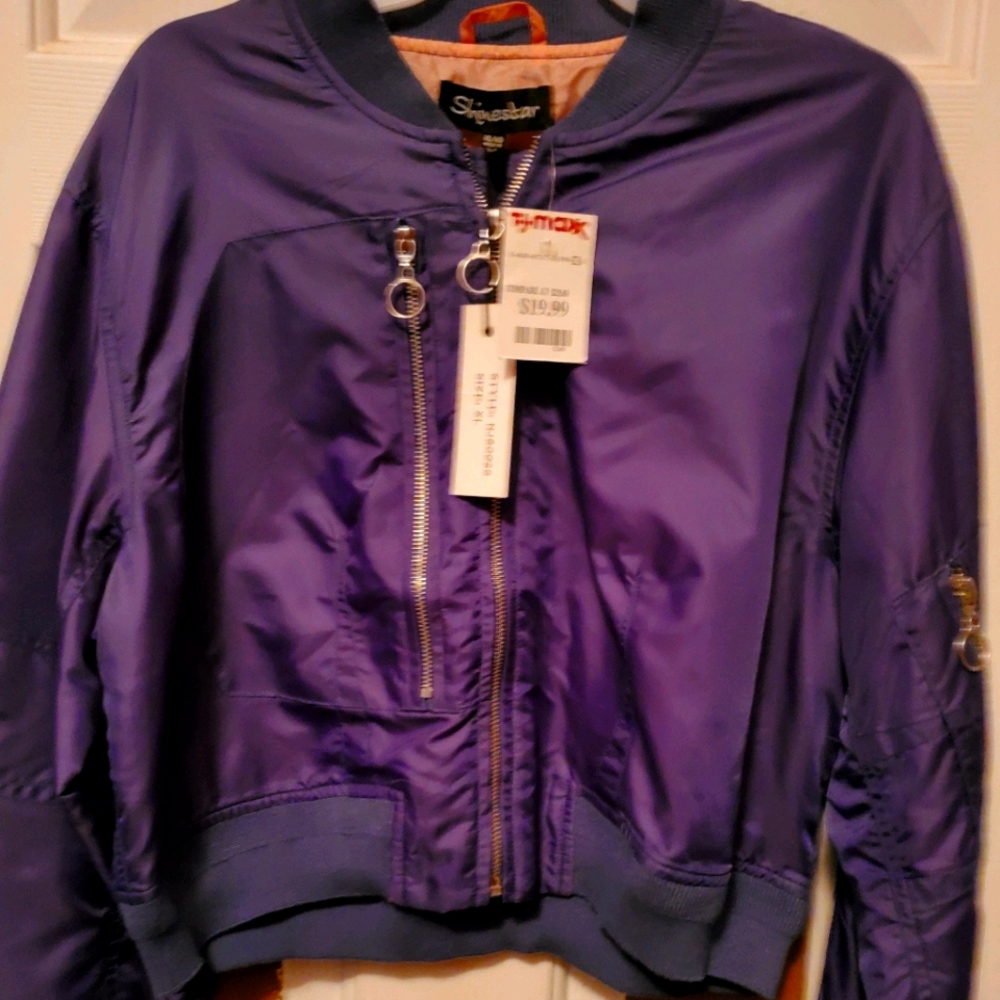 Above the waste jacket.